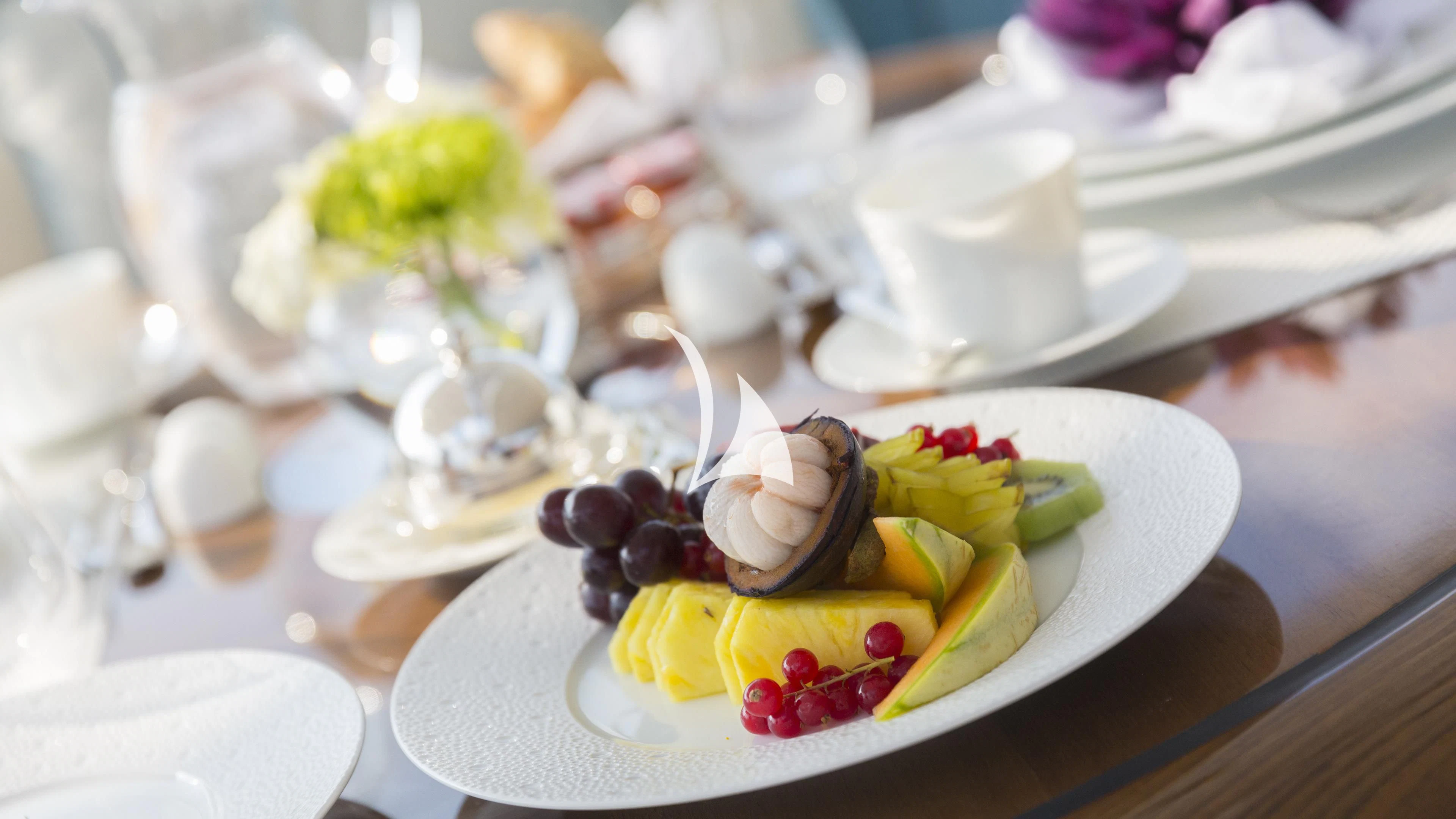 a plate of food aboard NIRVANA Yacht for Sale