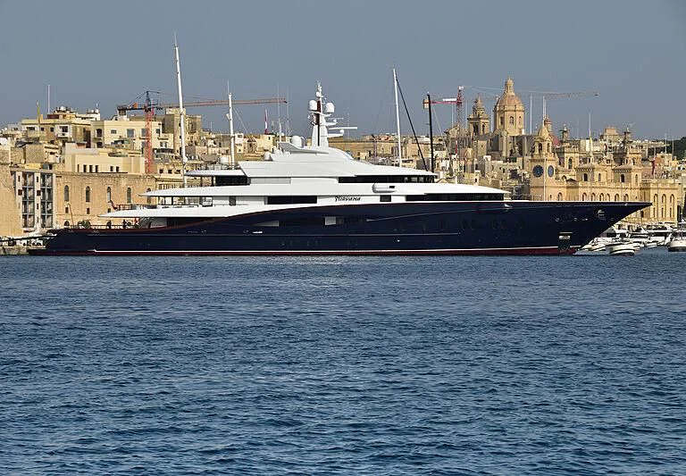 a large ship in the water aboard NIRVANA Yacht for Sale