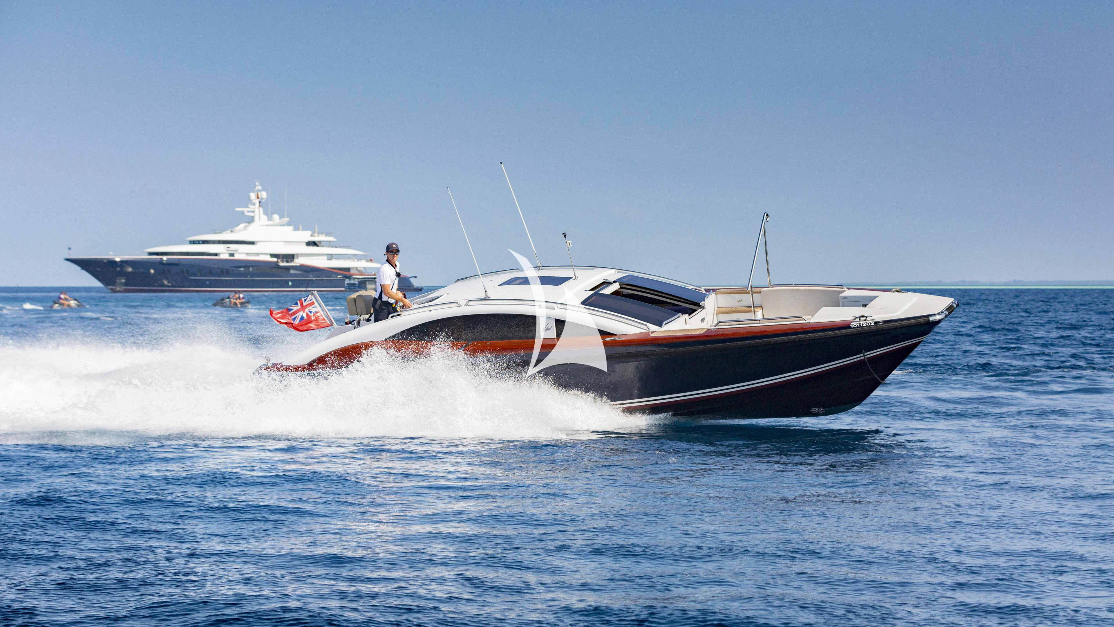 a boat with a person on it aboard NIRVANA Yacht for Sale