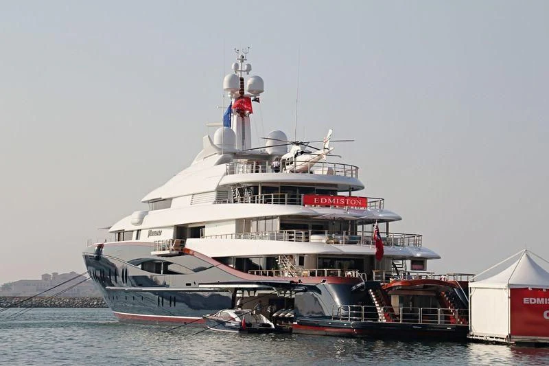 a large cruise ship docked aboard NIRVANA Yacht for Sale