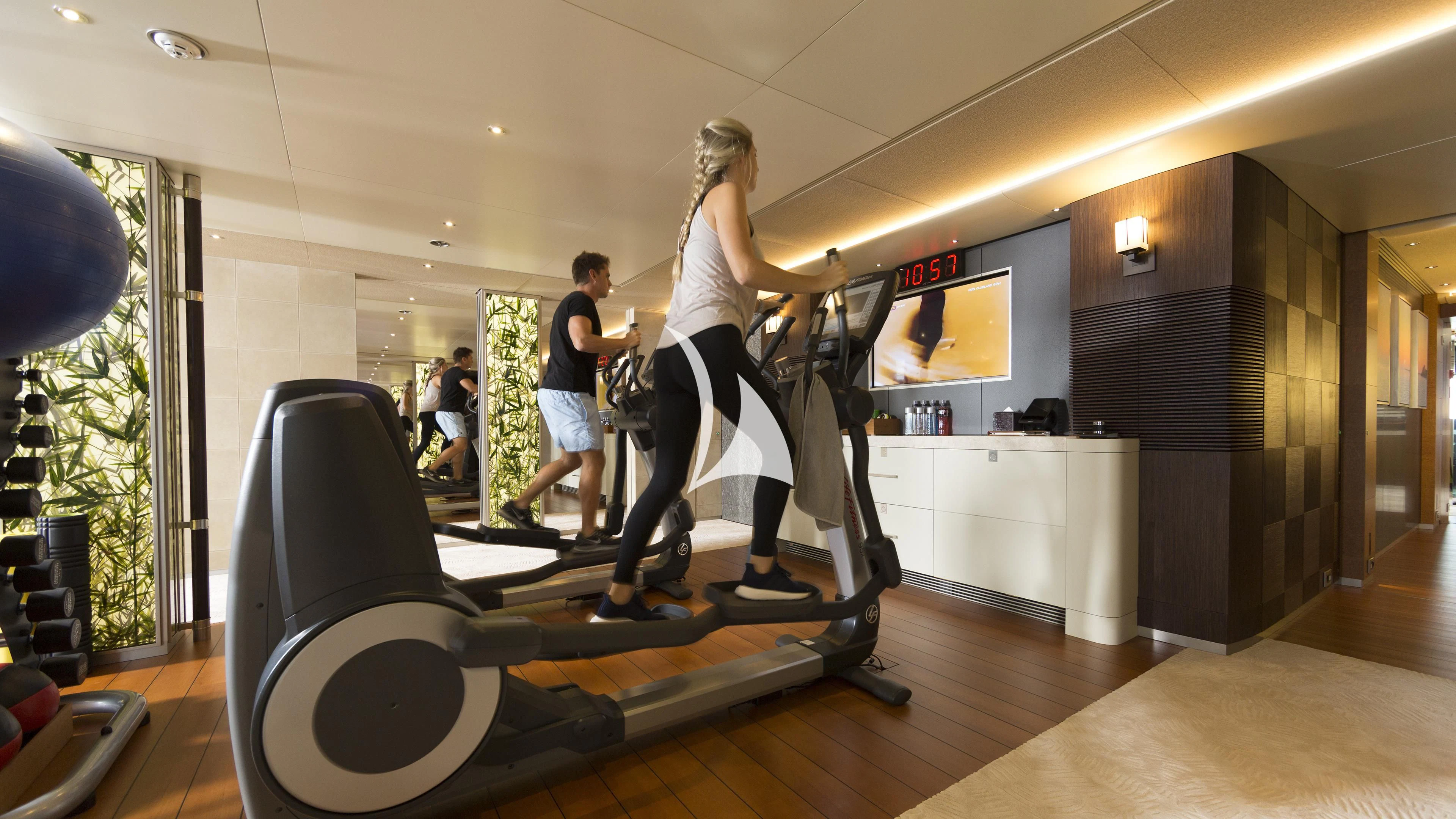 a person on a treadmill aboard NIRVANA Yacht for Sale