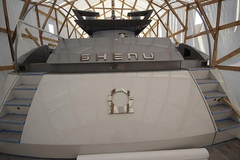 a large military tank aboard SHENU Yacht for Sale