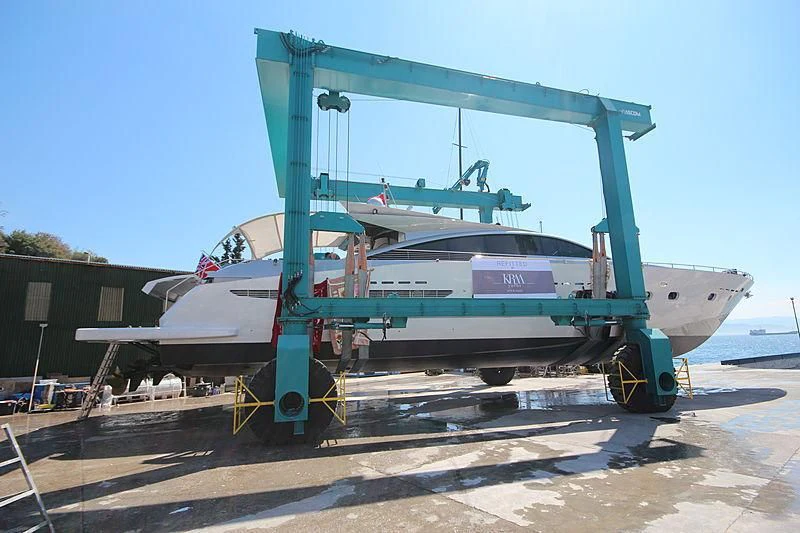 a small airplane on a stand aboard SHENU Yacht for Sale