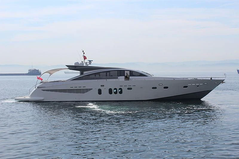 a white yacht on the water aboard SHENU Yacht for Sale