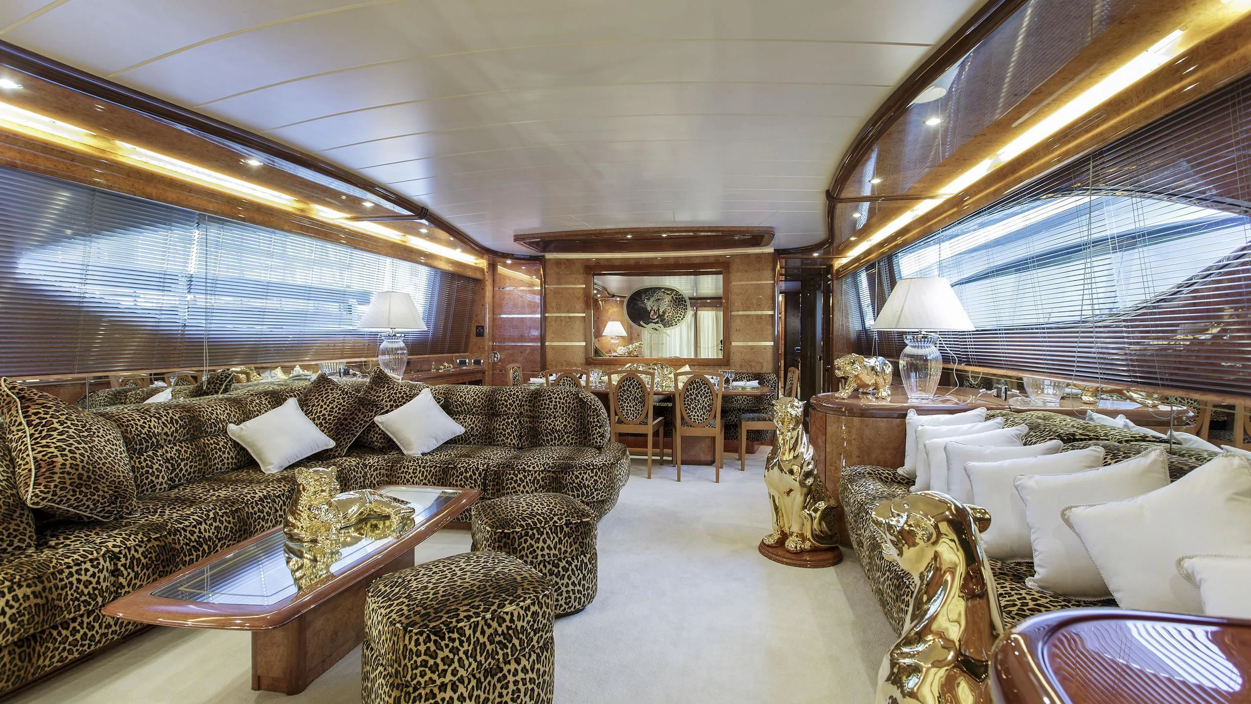 a living room with a large window aboard SEA JAGUAR Yacht for Sale