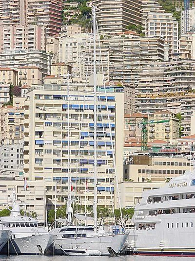a tall building with many windows aboard TAOUEY Yacht for Sale