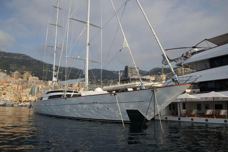 a couple of boats are parked in a harbor aboard TAOUEY Yacht for Sale