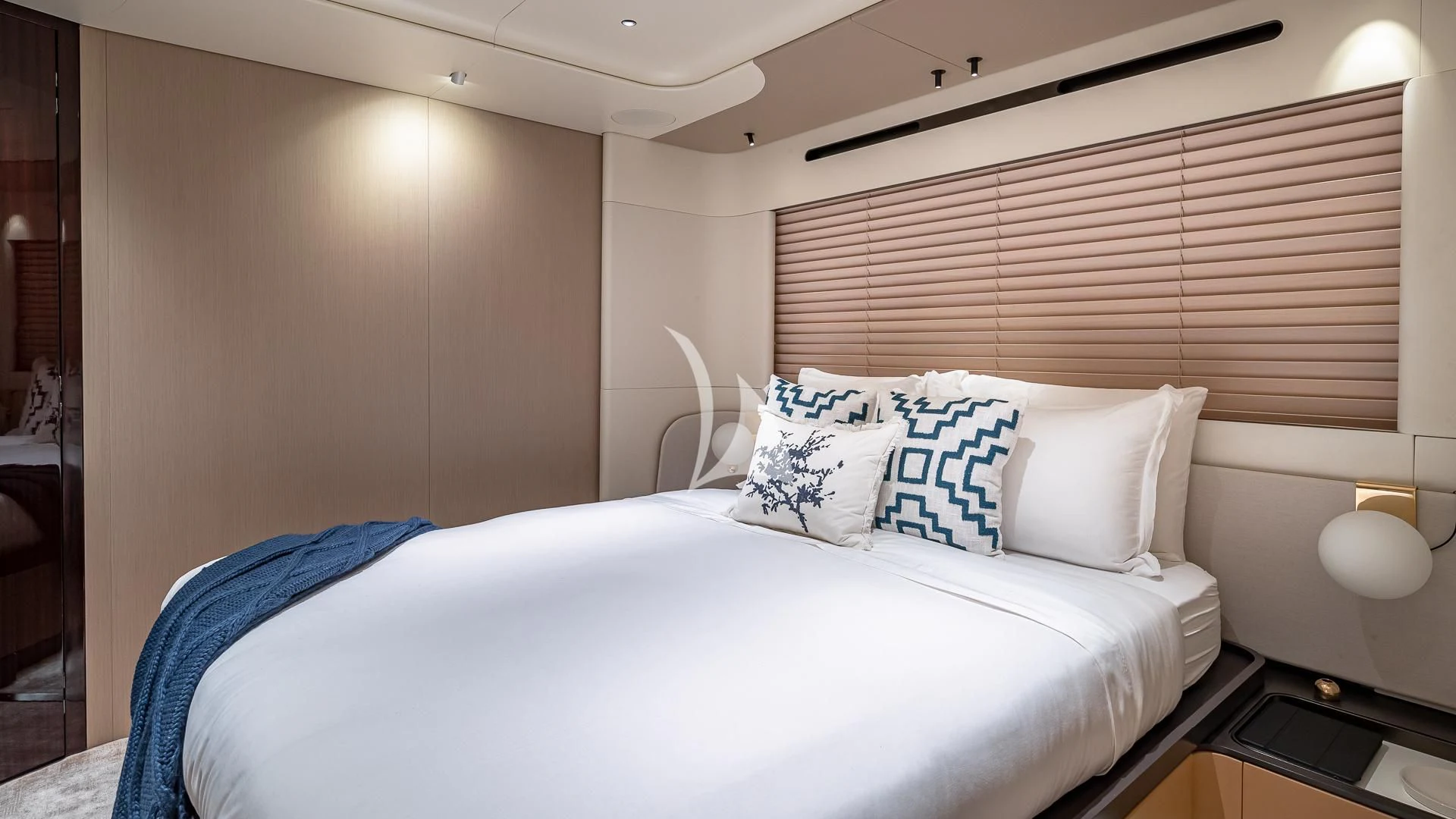 a bed with white sheets aboard VOLO MARE Yacht for Charter