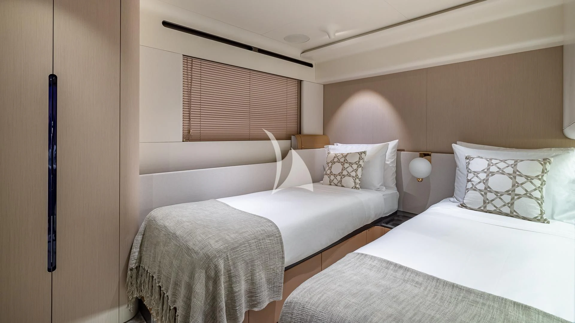 a couple of beds in a room aboard VOLO MARE Yacht for Charter