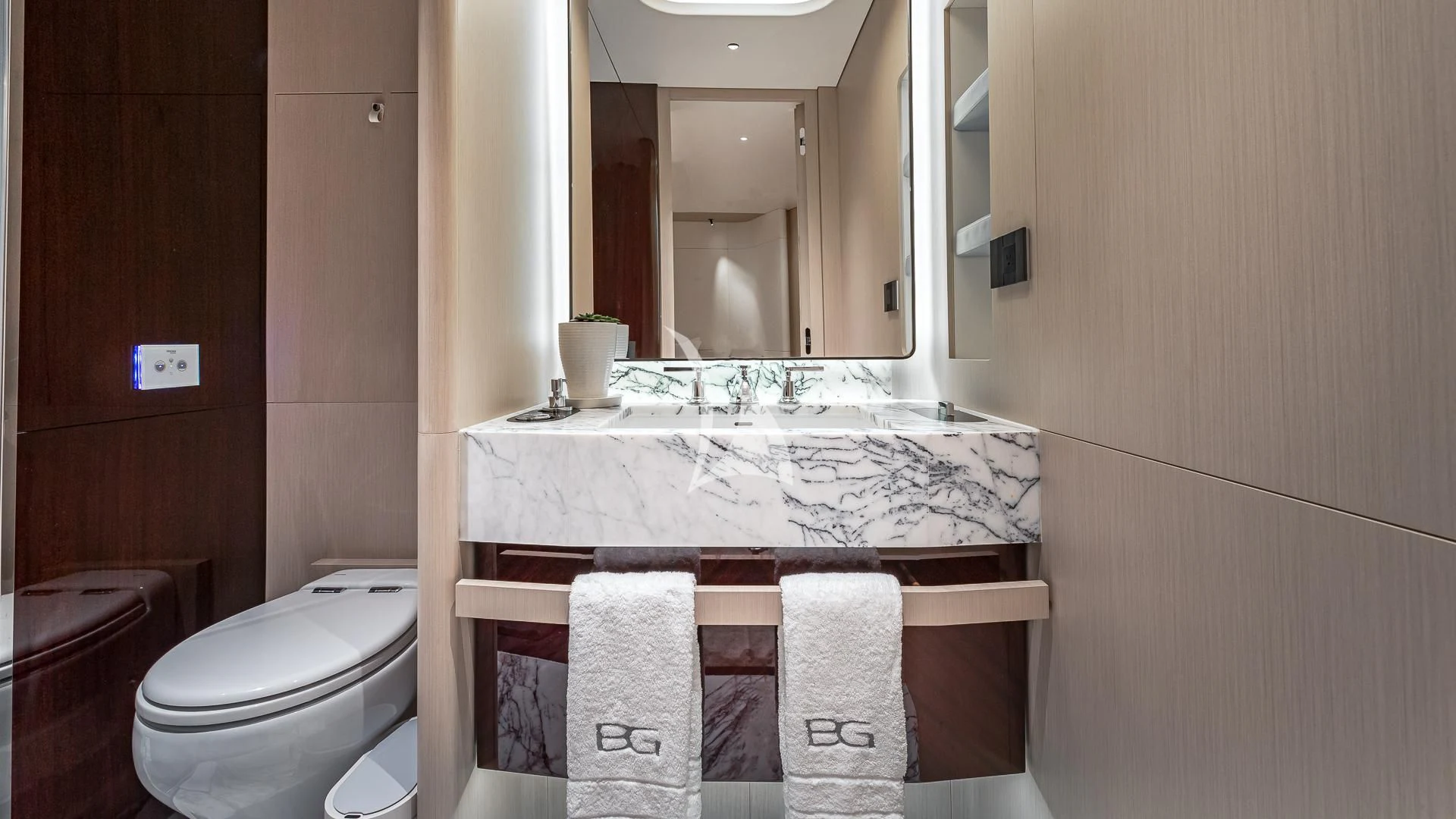 a bathroom with a large mirror aboard VOLO MARE Yacht for Charter