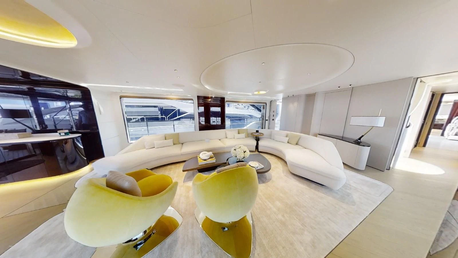 a modern living room with a large white ceiling aboard VOLO MARE Yacht for Charter