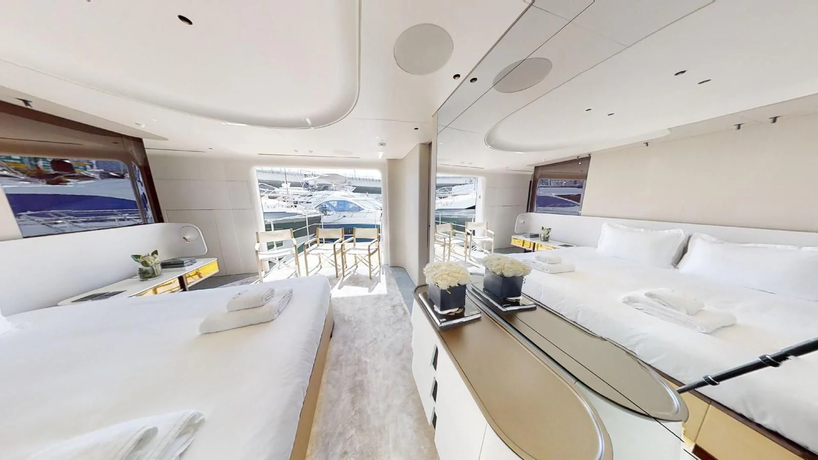 a room with a large window and a view of the ocean aboard VOLO MARE Yacht for Charter