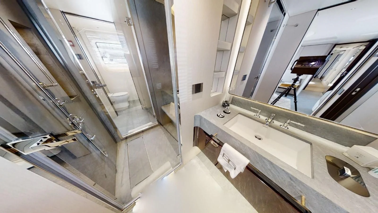 a bathroom with a large mirror aboard VOLO MARE Yacht for Charter