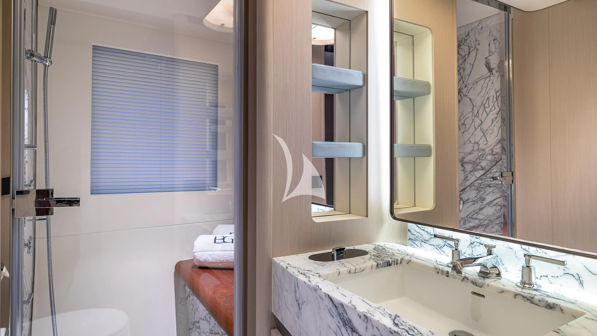a bathroom with a sink and a mirror aboard VOLO MARE Yacht for Charter