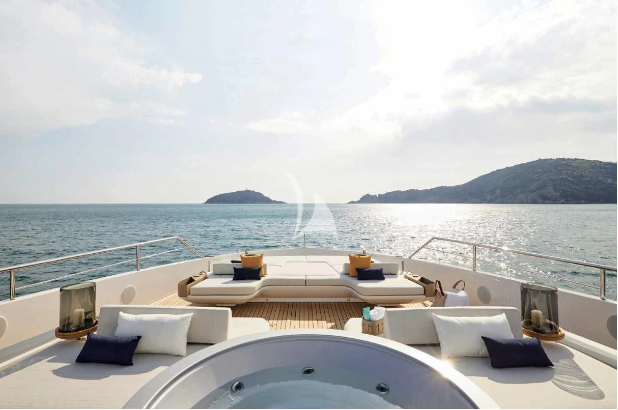 a large white boat on a body of water aboard VOLO MARE Yacht for Charter