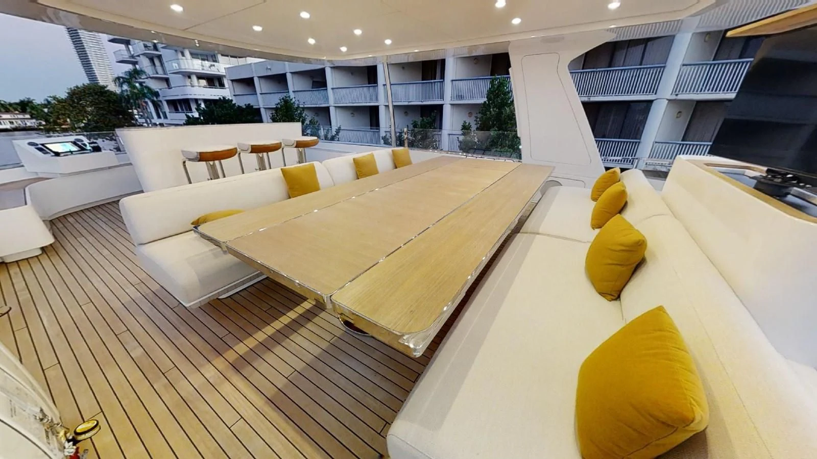 a room with a large room with chairs and a table aboard VOLO MARE Yacht for Charter