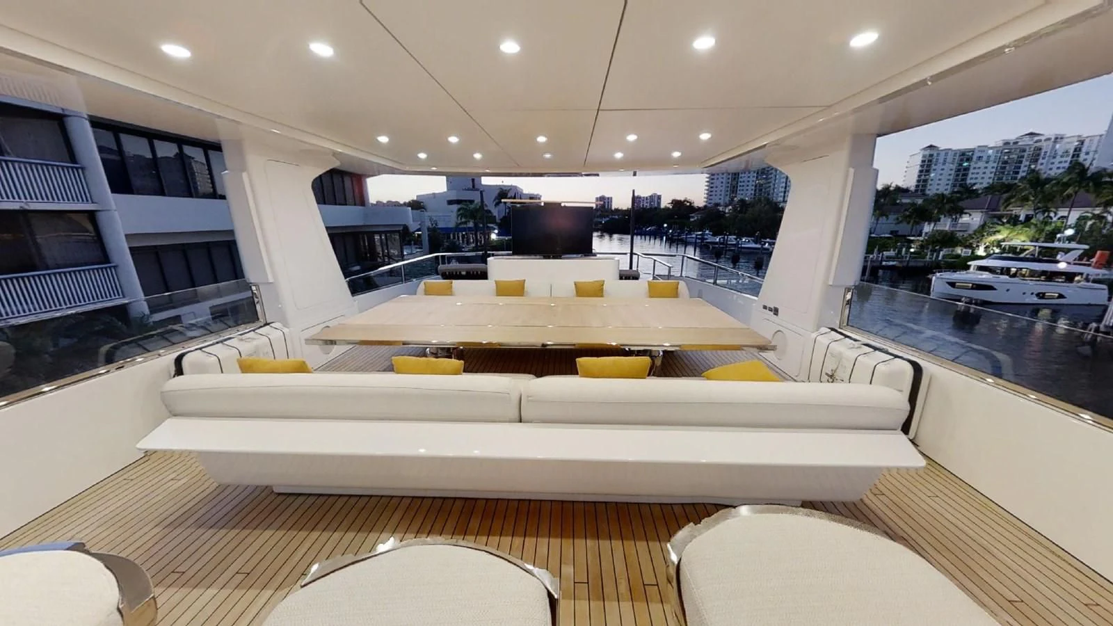 a room with a large table and chairs aboard VOLO MARE Yacht for Charter