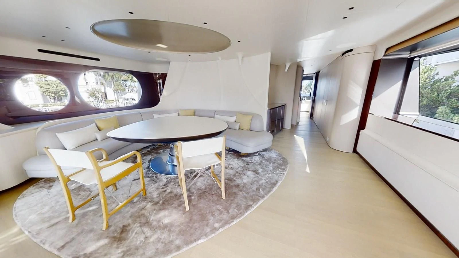 a room with a table and chairs aboard VOLO MARE Yacht for Charter