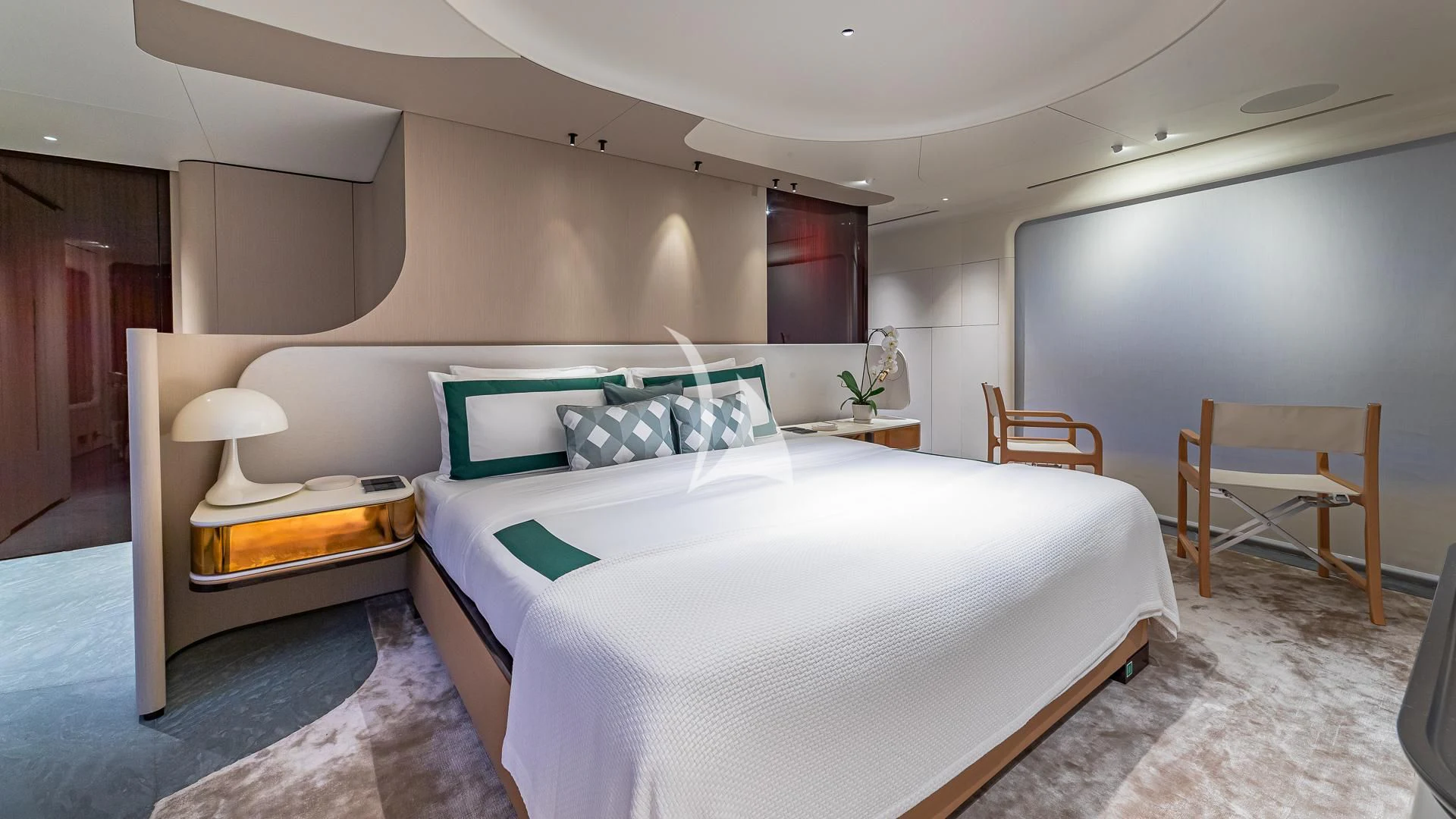 a room with a bed and a desk aboard VOLO MARE Yacht for Charter