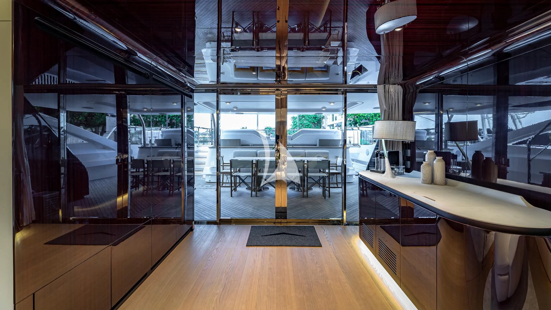 a room with a table and chairs aboard VOLO MARE Yacht for Charter