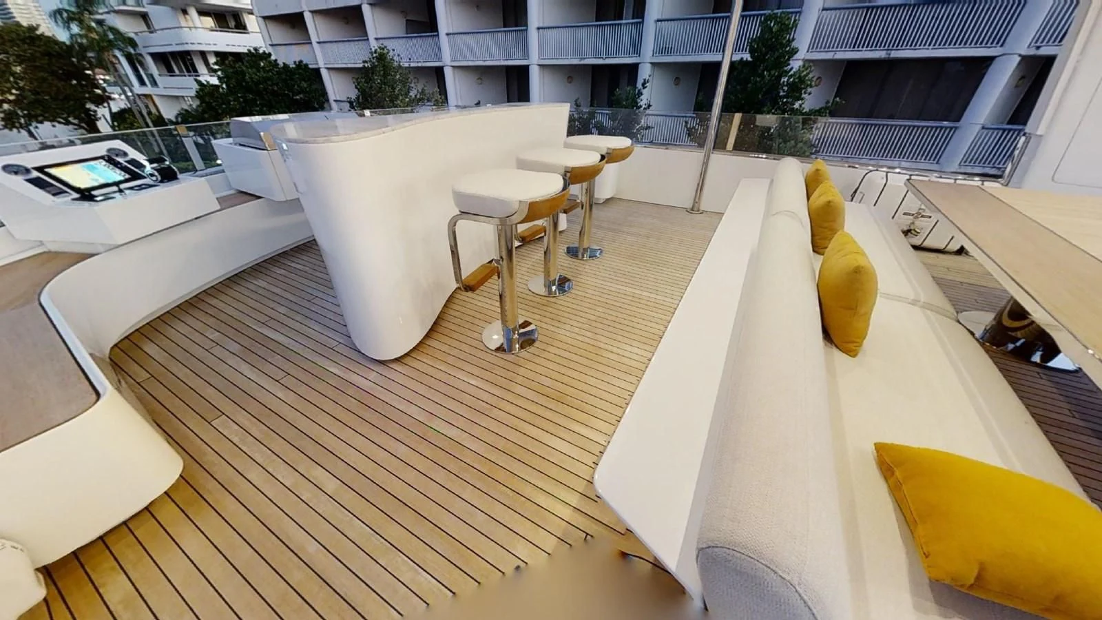 a room with tables and chairs aboard VOLO MARE Yacht for Charter
