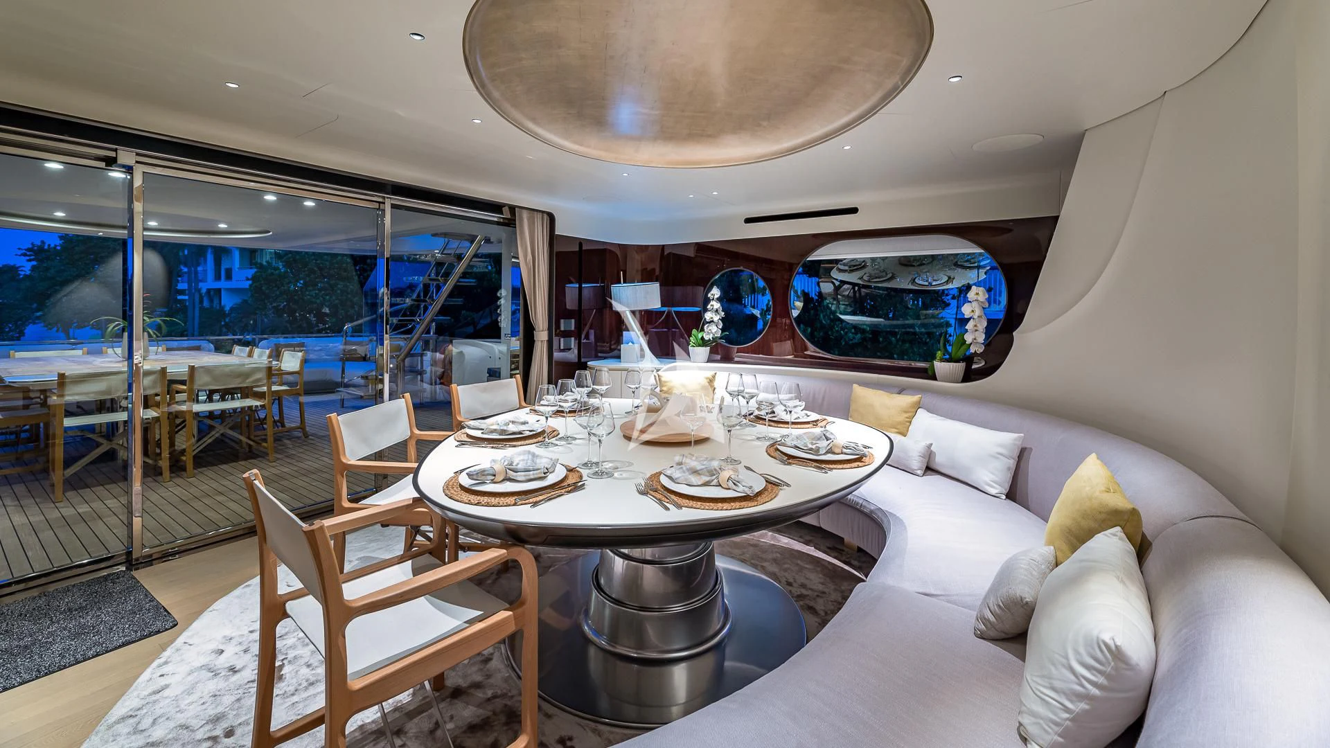 a room with a table and chairs aboard VOLO MARE Yacht for Charter