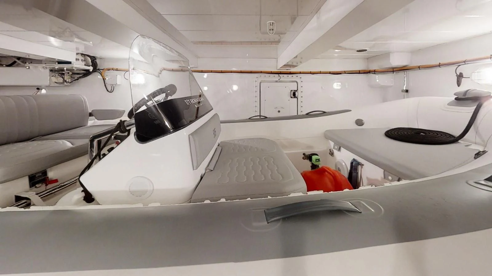 a white car with a hood aboard VOLO MARE Yacht for Charter