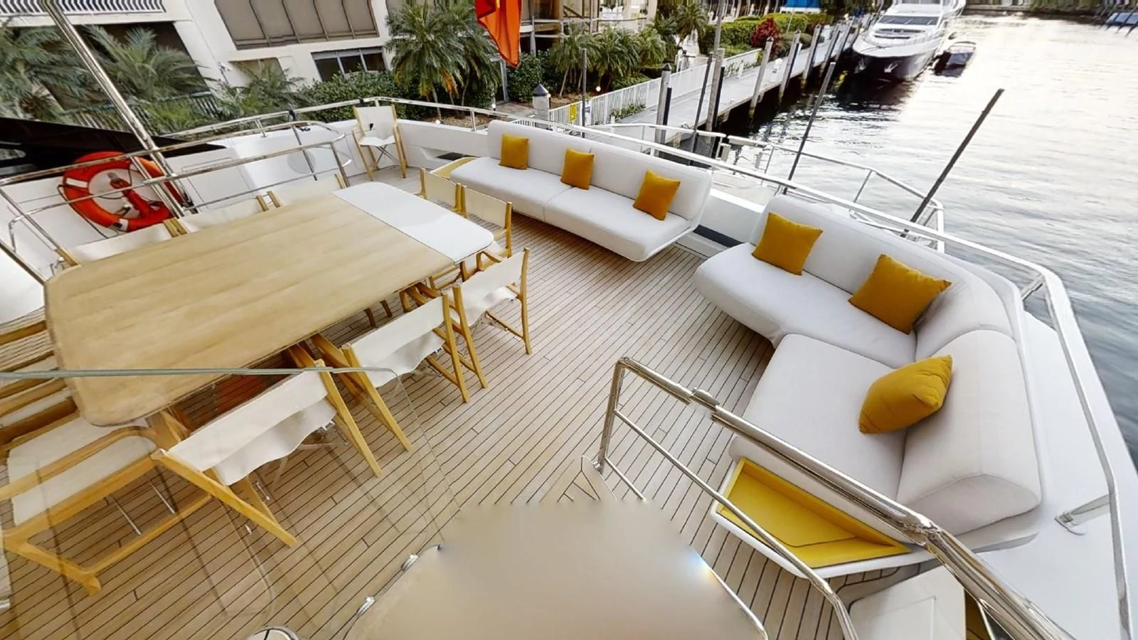a deck with chairs and tables aboard VOLO MARE Yacht for Charter