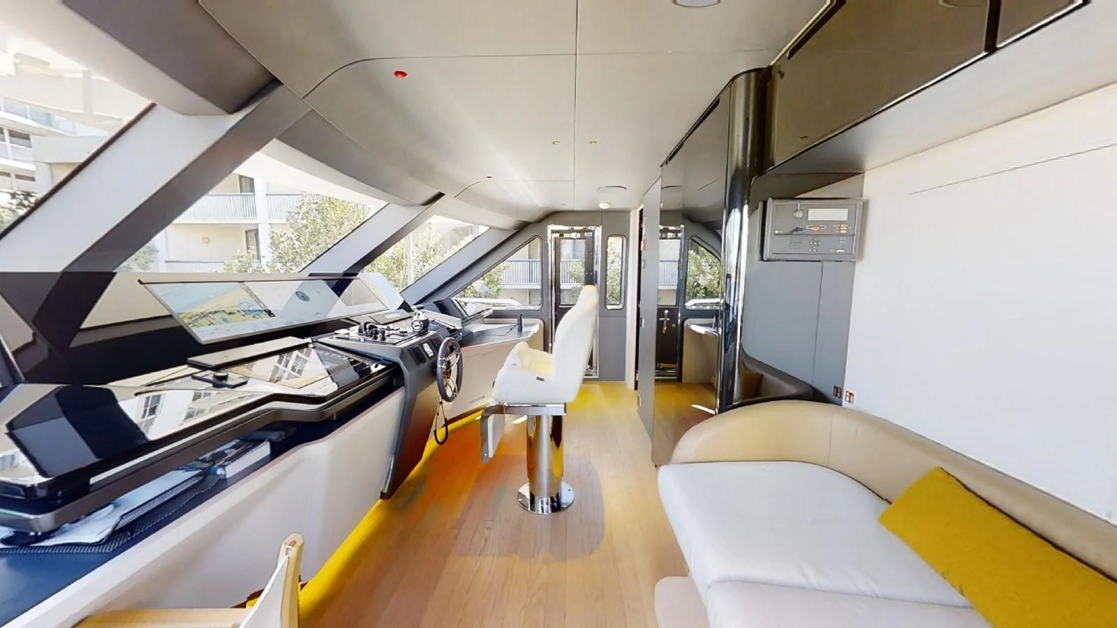inside of a vehicle with desks and chairs aboard VOLO MARE Yacht for Charter