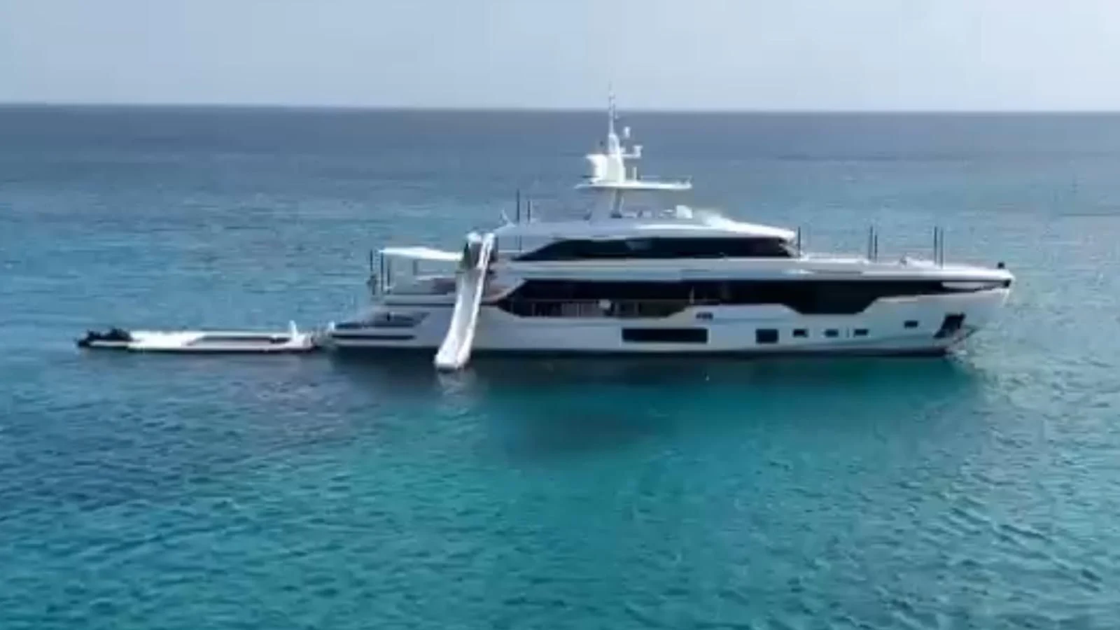 a large white boat in the water aboard VOLO MARE Yacht for Charter
