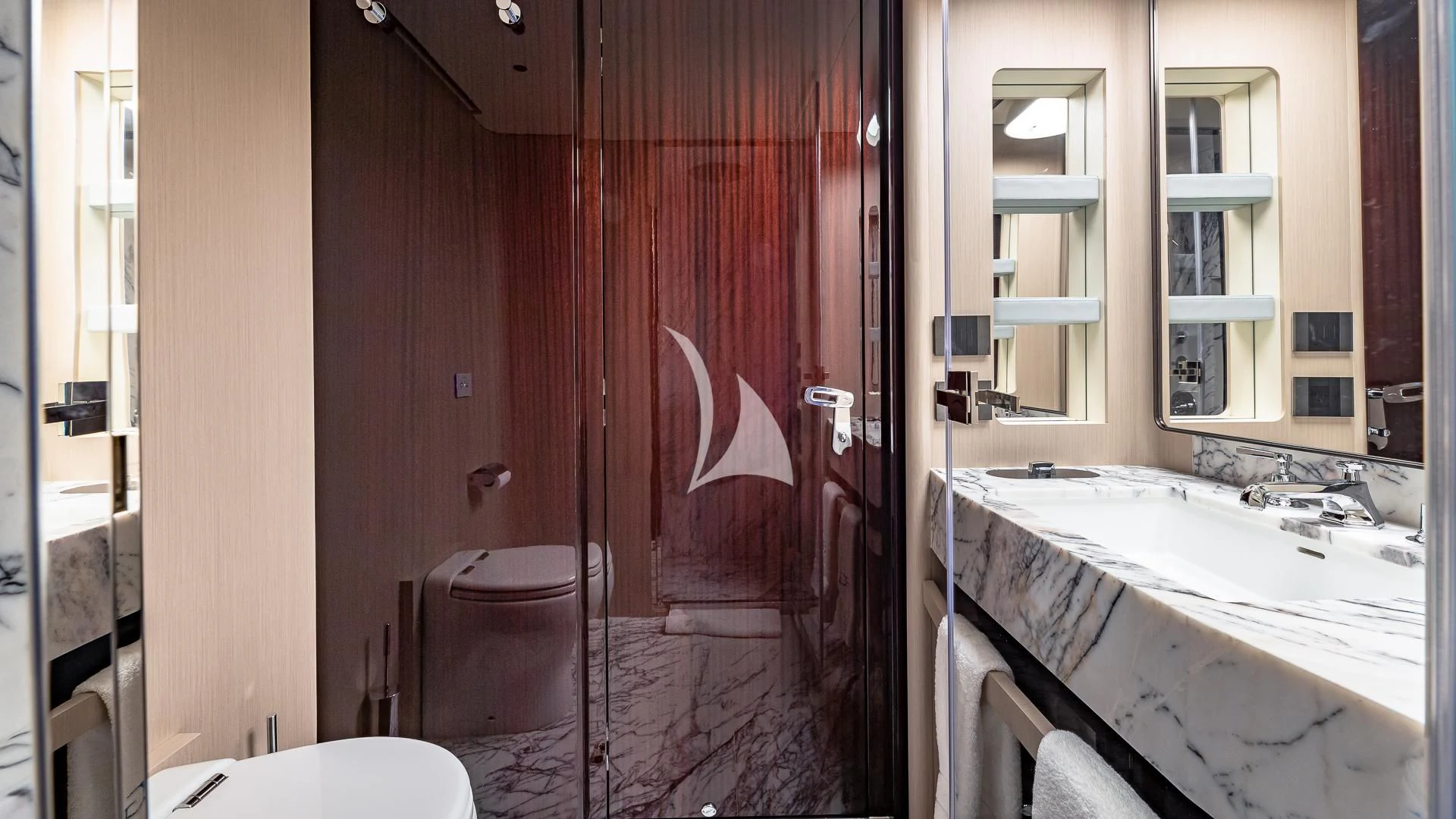 a bathroom with red walls aboard VOLO MARE Yacht for Charter