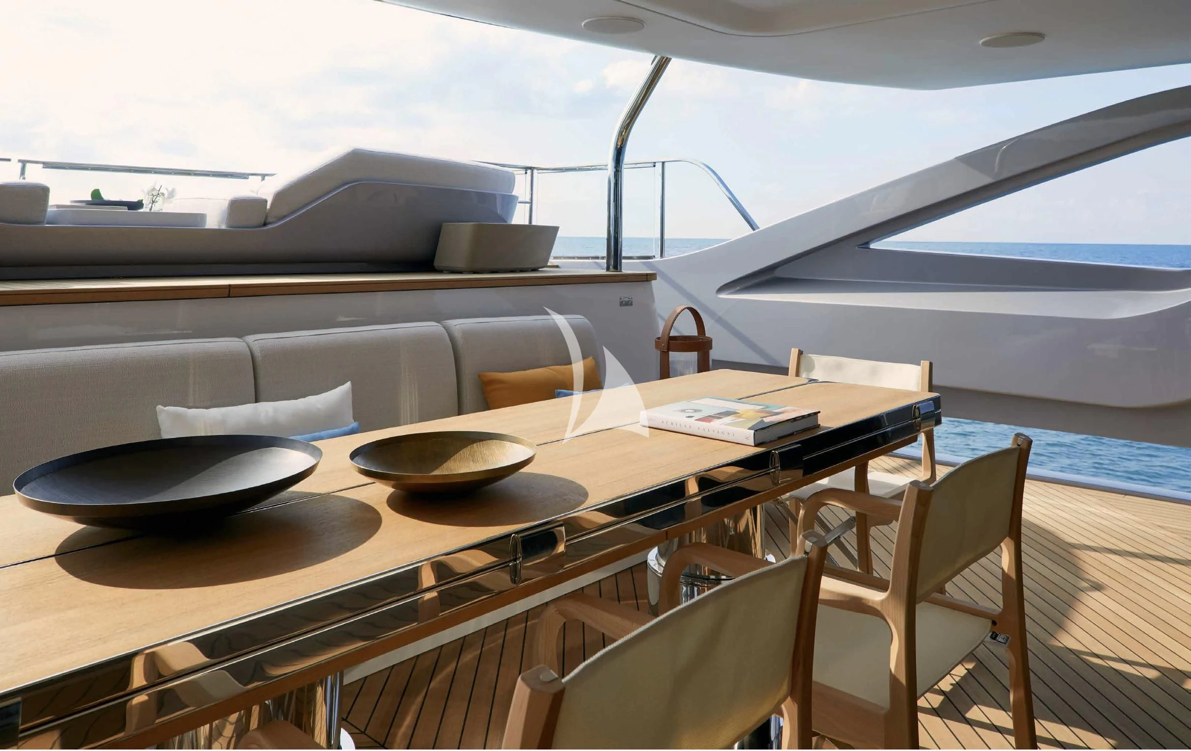 a table with a plate and a bowl on it aboard VOLO MARE Yacht for Charter