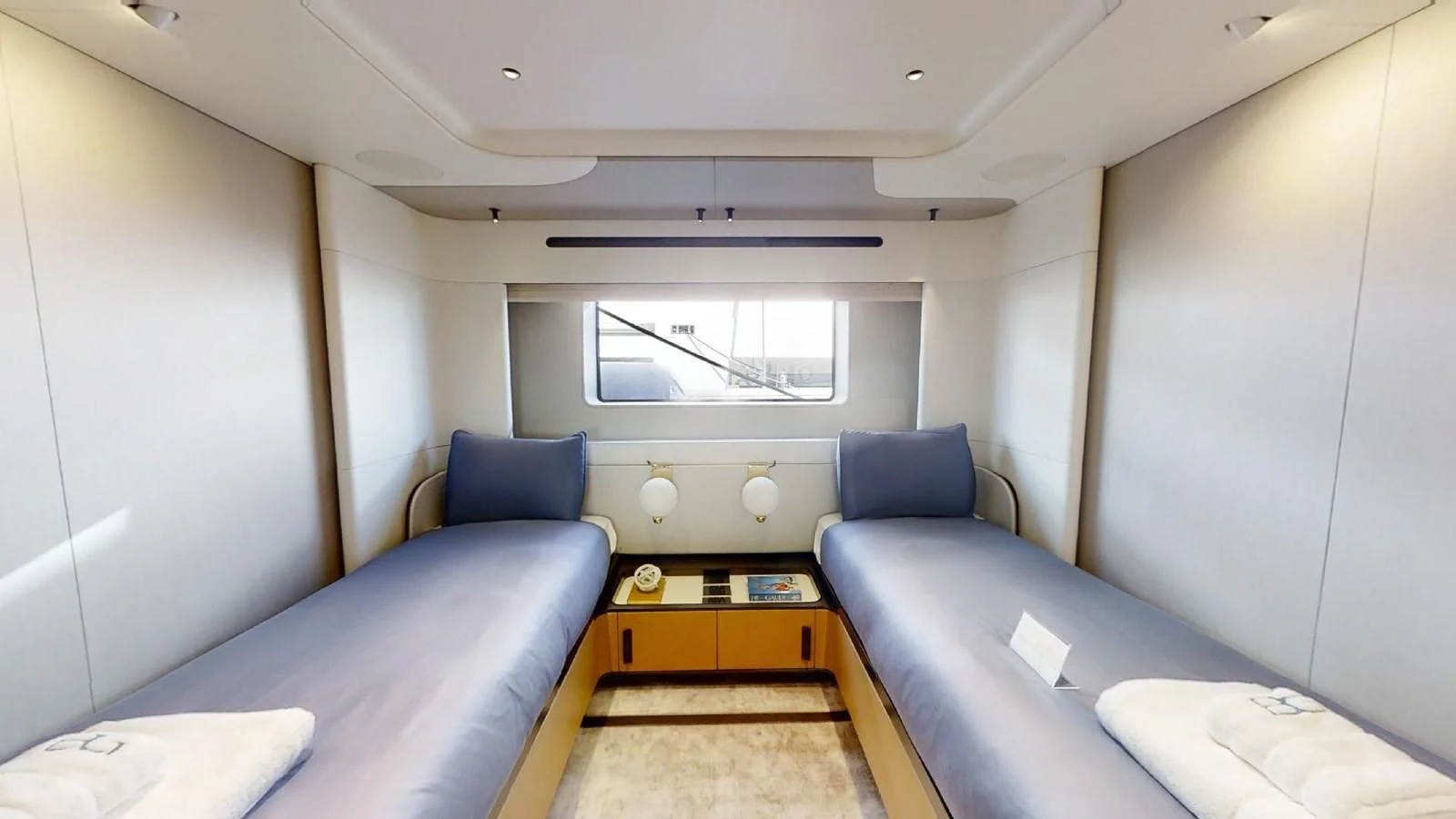 a room with a bed and a couch aboard VOLO MARE Yacht for Charter