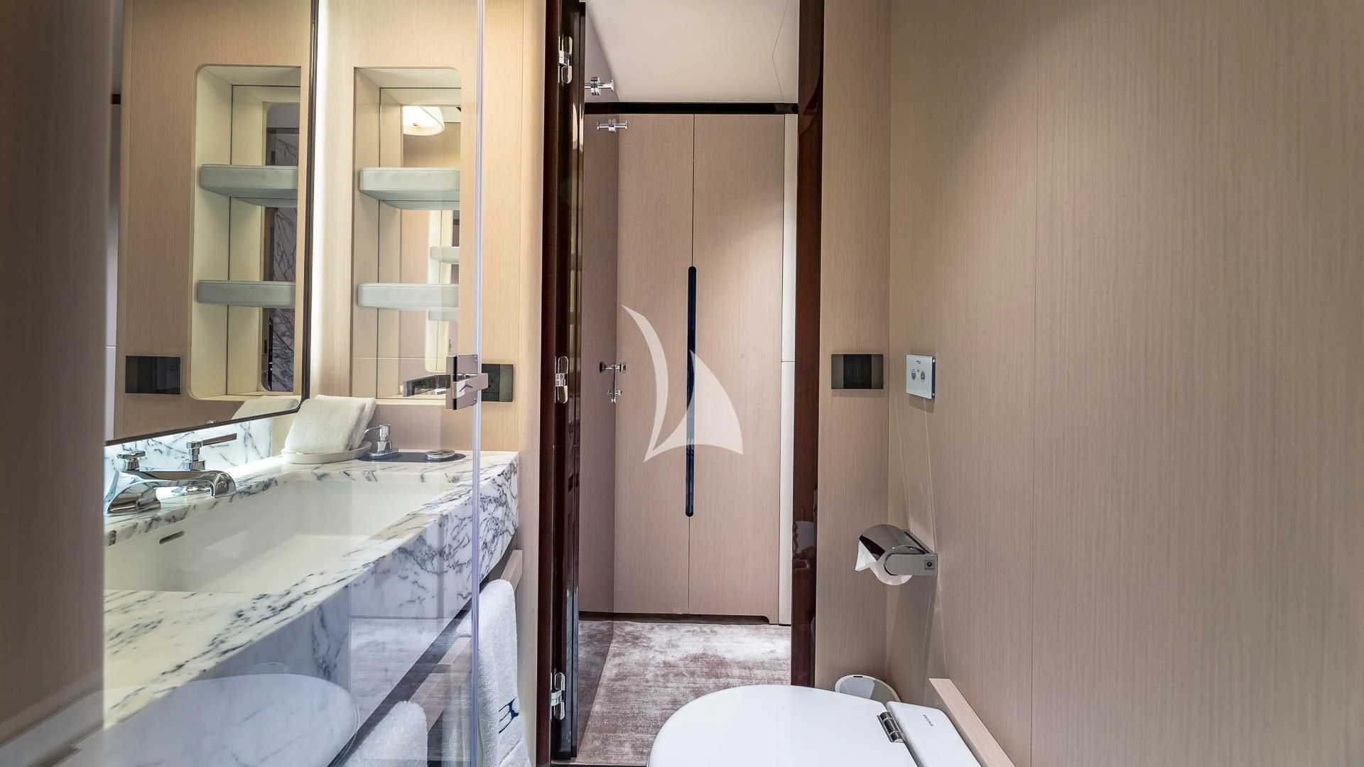 a bathroom with a tub sink and toilet aboard VOLO MARE Yacht for Charter