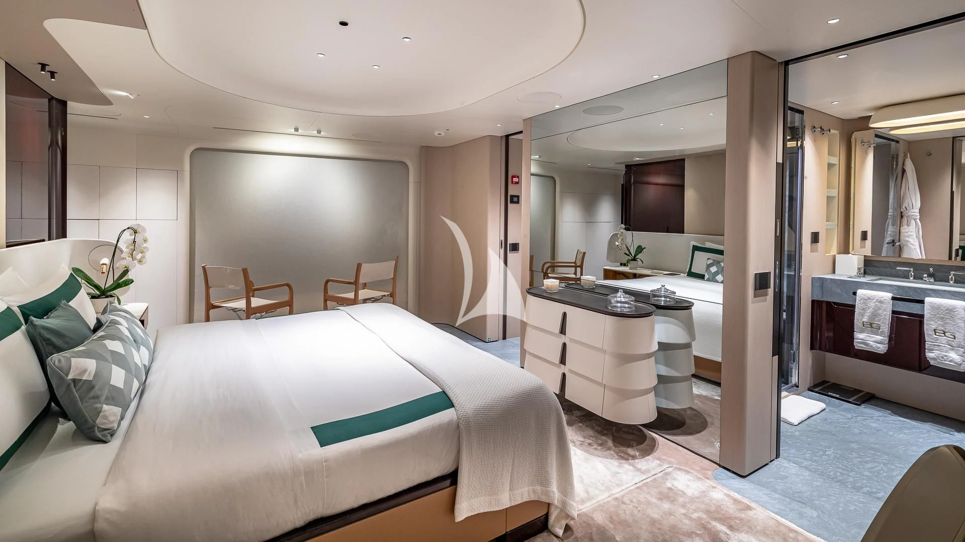 a bedroom with a bed and a sink aboard VOLO MARE Yacht for Charter