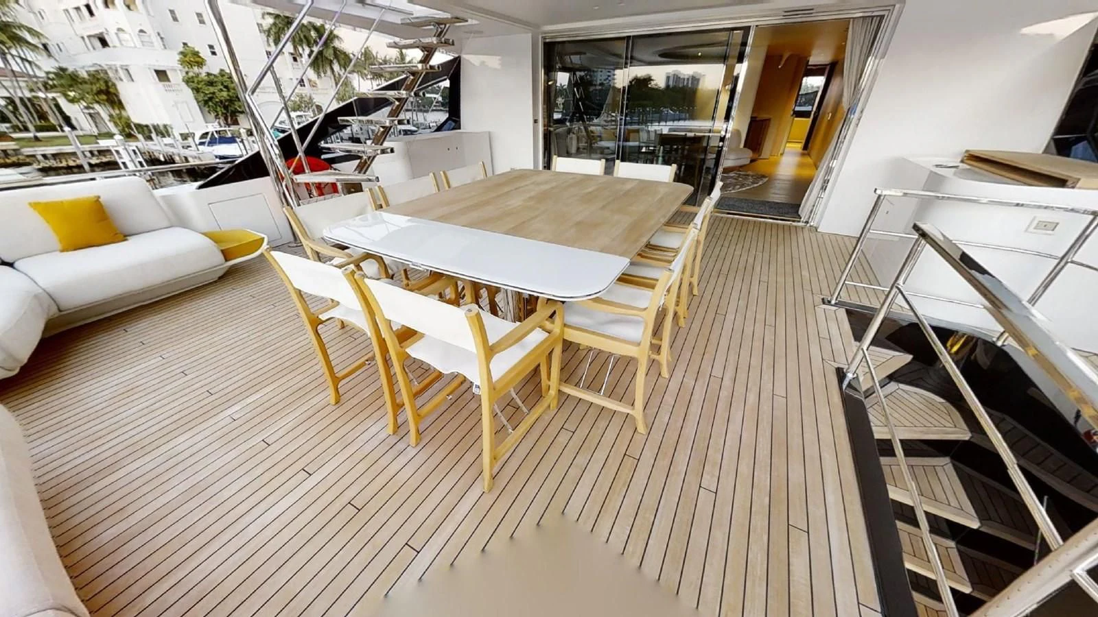 a room with tables and chairs aboard VOLO MARE Yacht for Charter