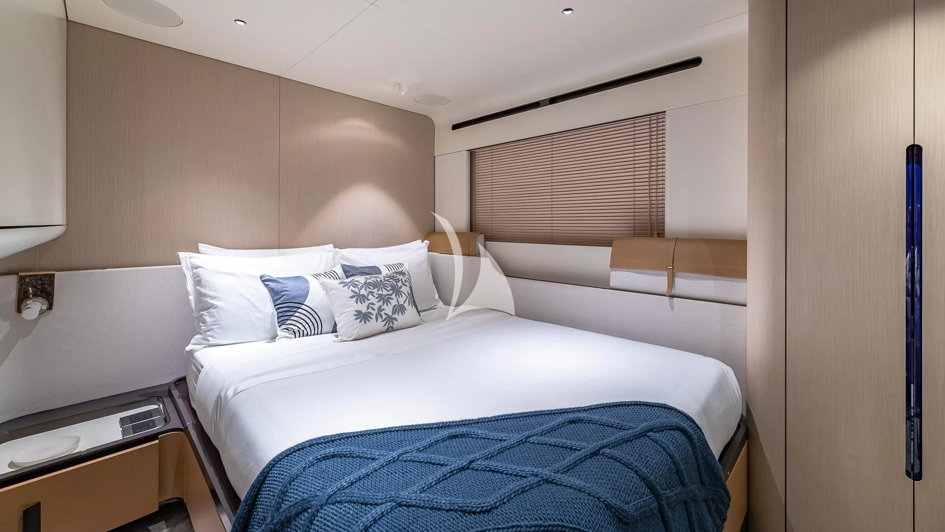a bed with white sheets aboard VOLO MARE Yacht for Charter