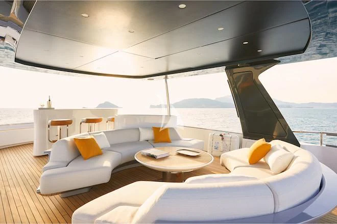 a living room with a large window aboard VOLO MARE Yacht for Charter