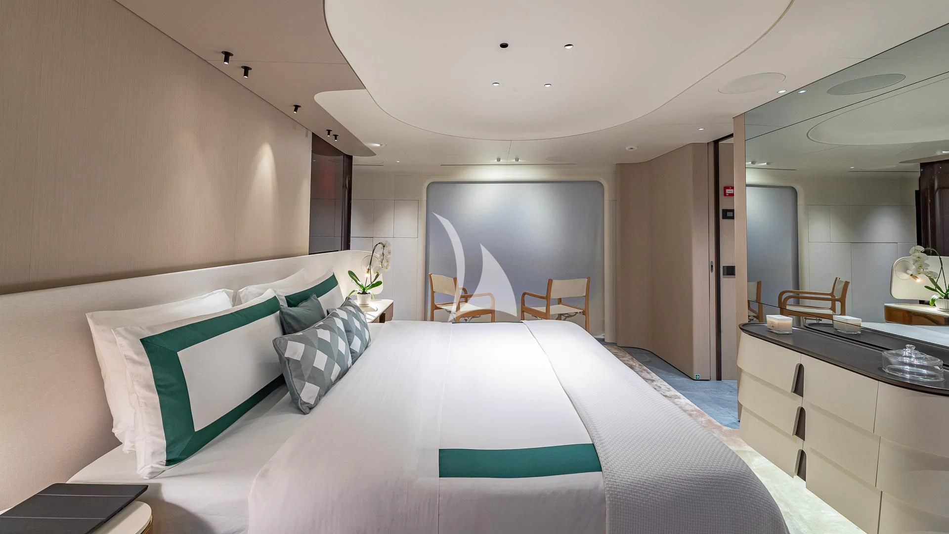 a large white bed in a room aboard VOLO MARE Yacht for Charter