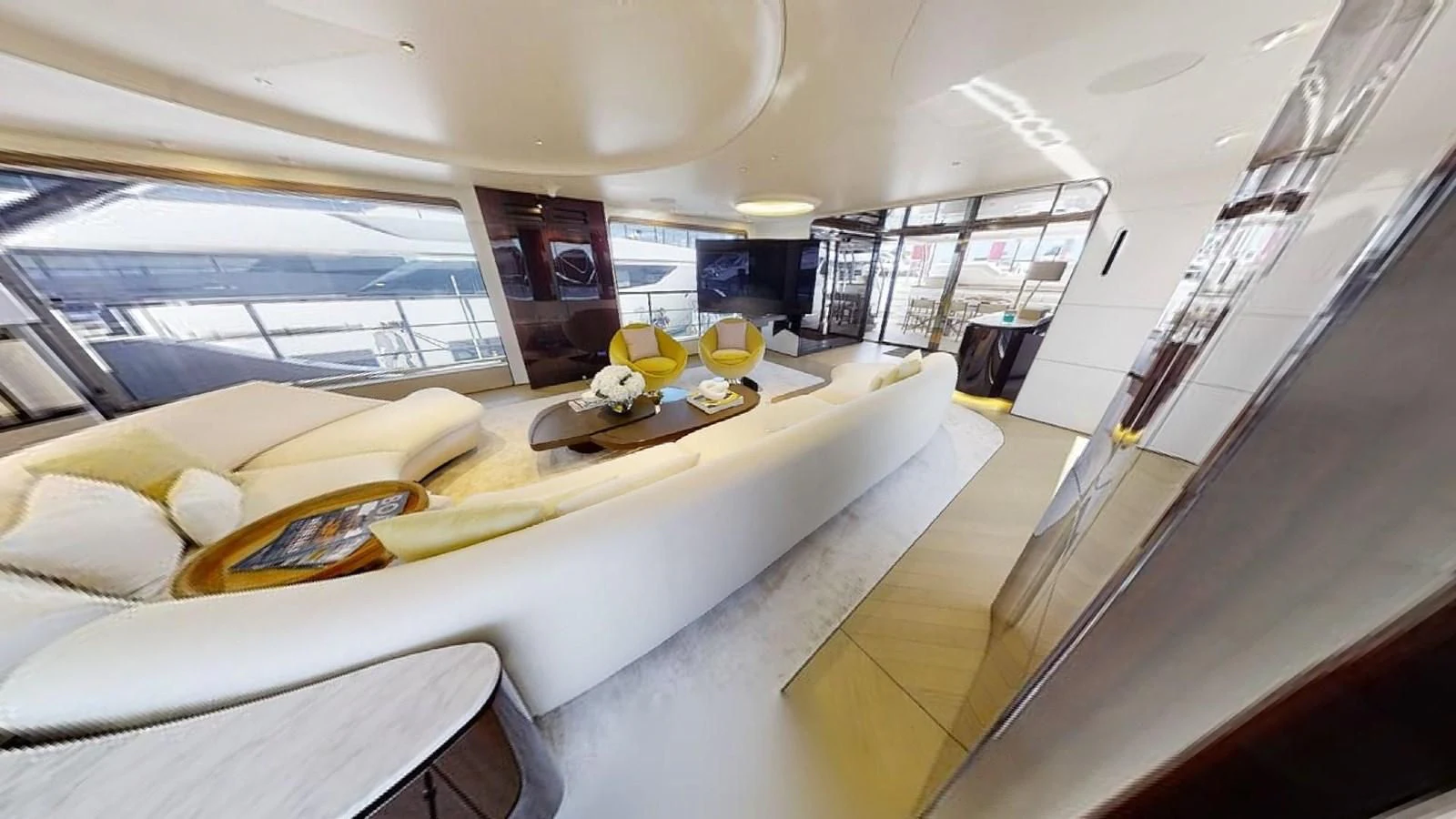 a room with a table and chairs aboard VOLO MARE Yacht for Charter