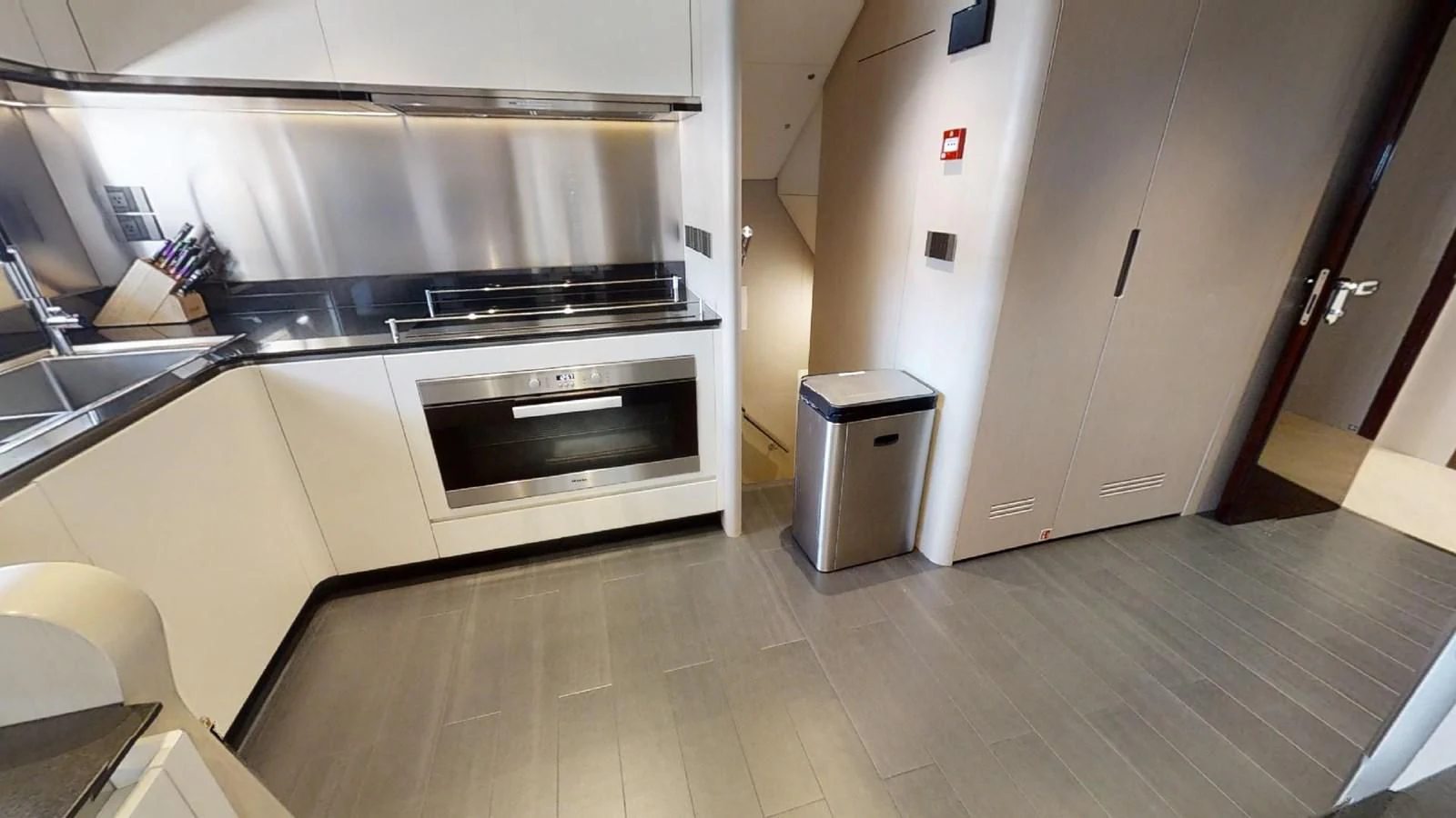 a kitchen with a stainless steel oven aboard VOLO MARE Yacht for Charter
