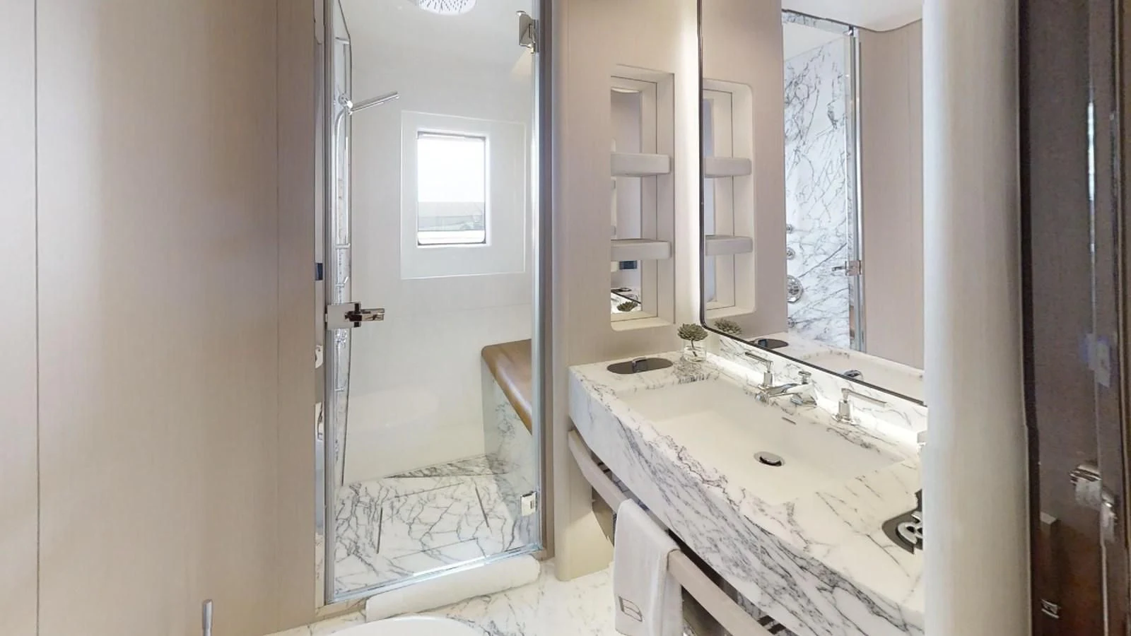a bathroom with a large mirror aboard VOLO MARE Yacht for Charter