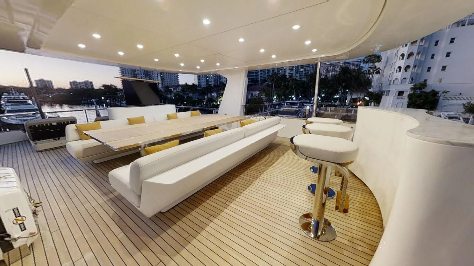 a room with a table and chairs aboard VOLO MARE Yacht for Charter
