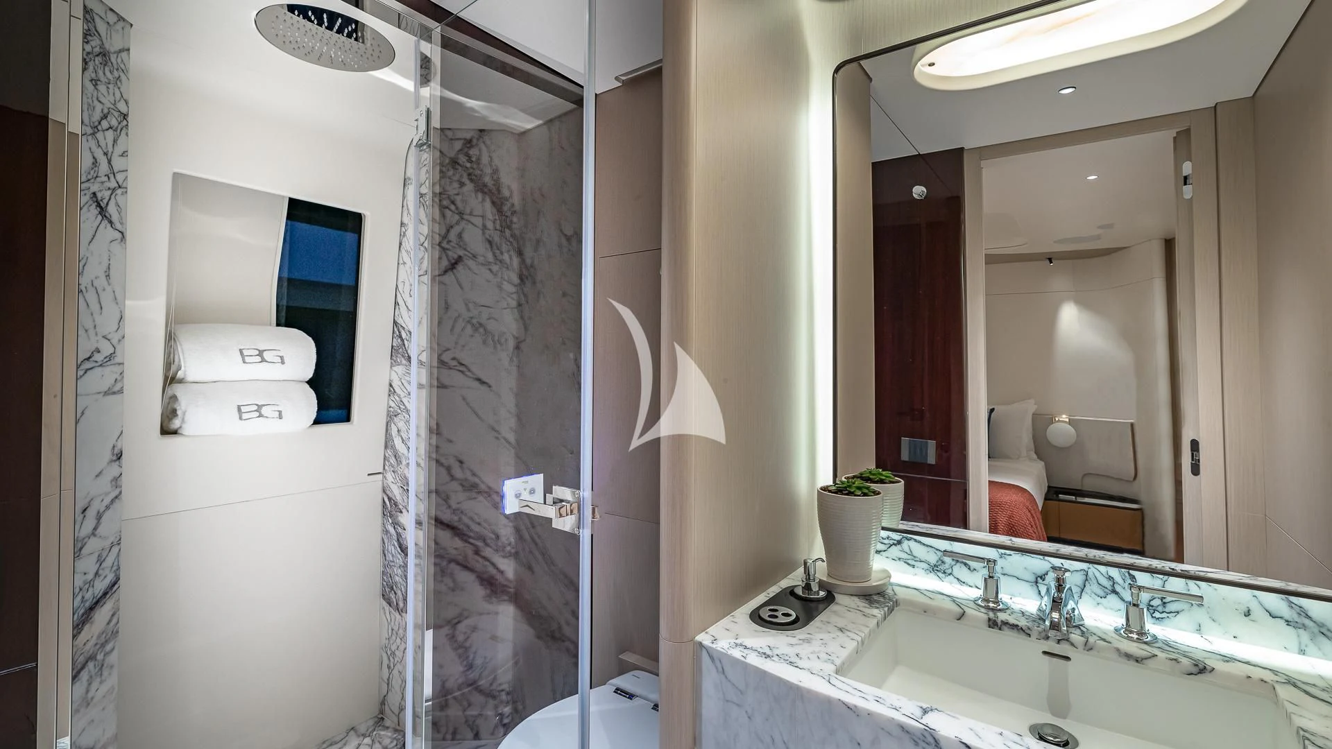 a bathroom with a large mirror aboard VOLO MARE Yacht for Charter