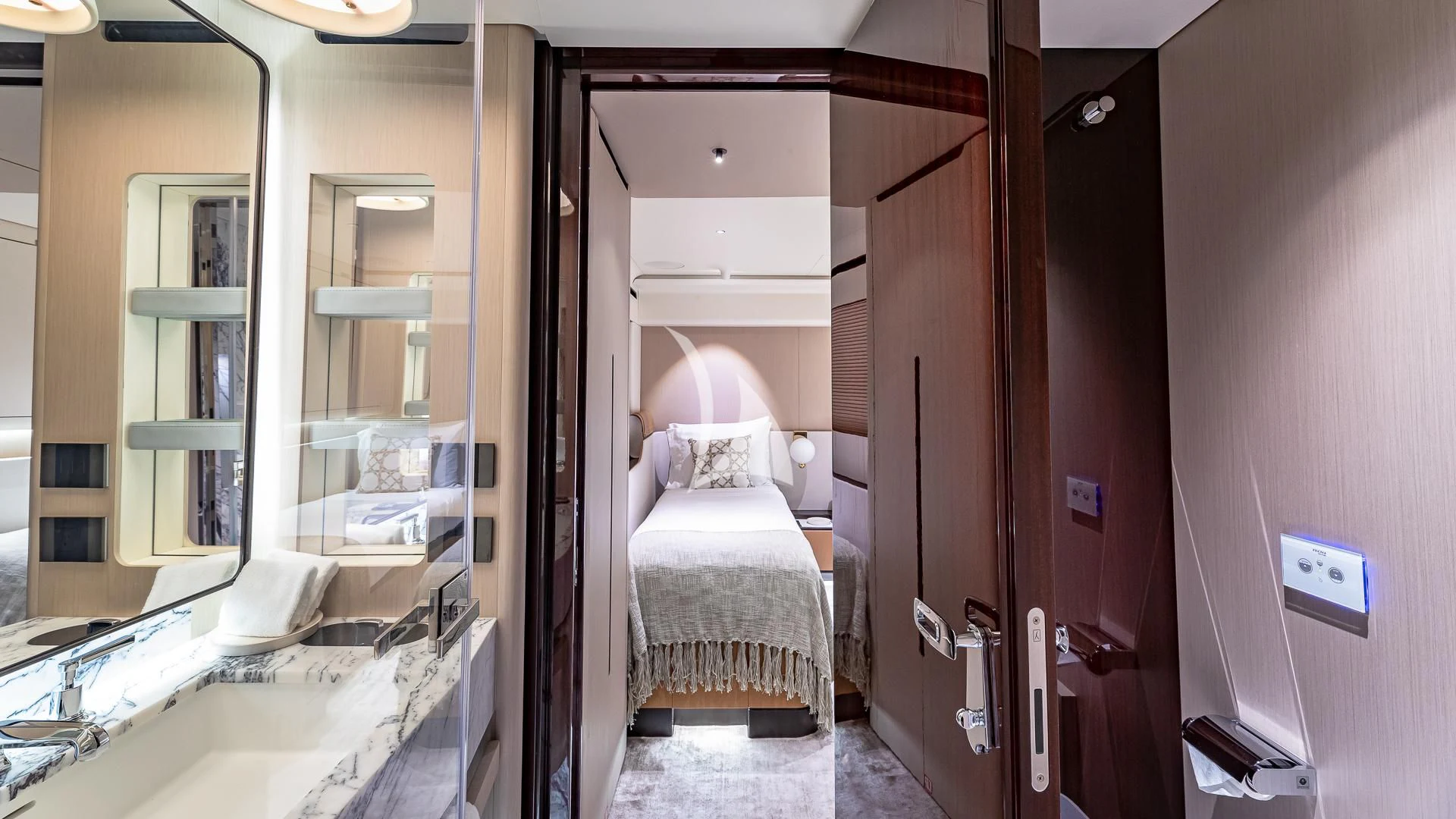 a room with a bed and a mirror aboard VOLO MARE Yacht for Charter