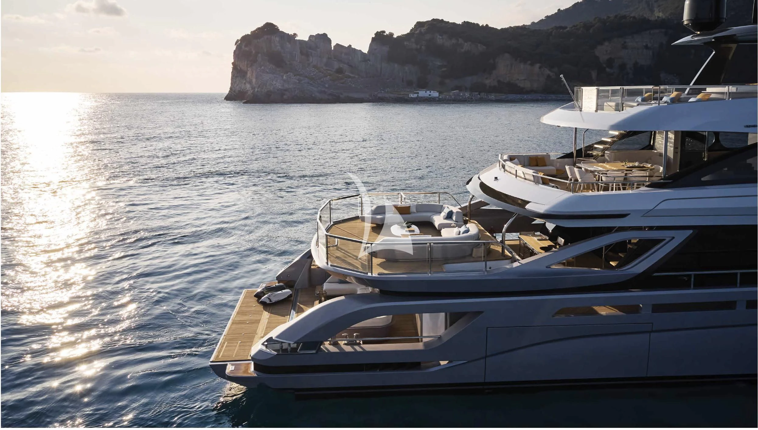 a group of boats on a body of water aboard VOLO MARE Yacht for Charter