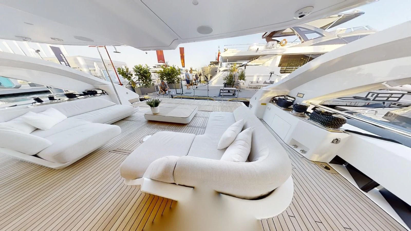 a room with a large white bed aboard VOLO MARE Yacht for Charter