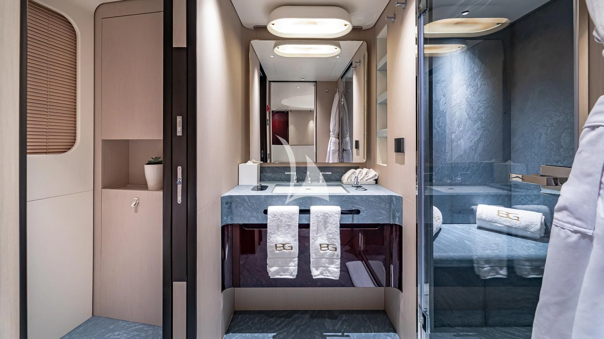 a bathroom with a glass shower aboard VOLO MARE Yacht for Charter