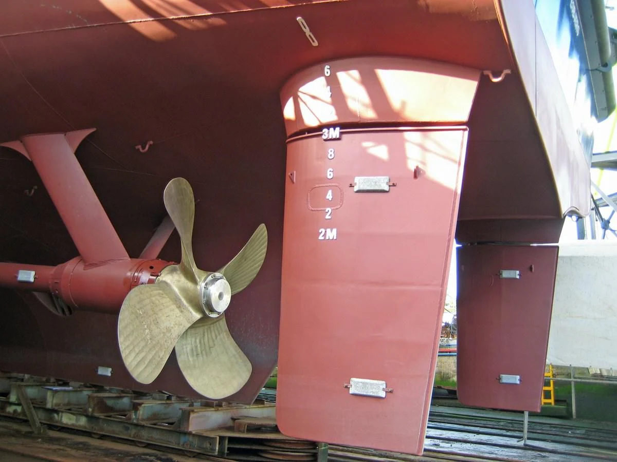 a red machine with a flower on the side aboard OCEAN XPLORER 71 Yacht for Sale