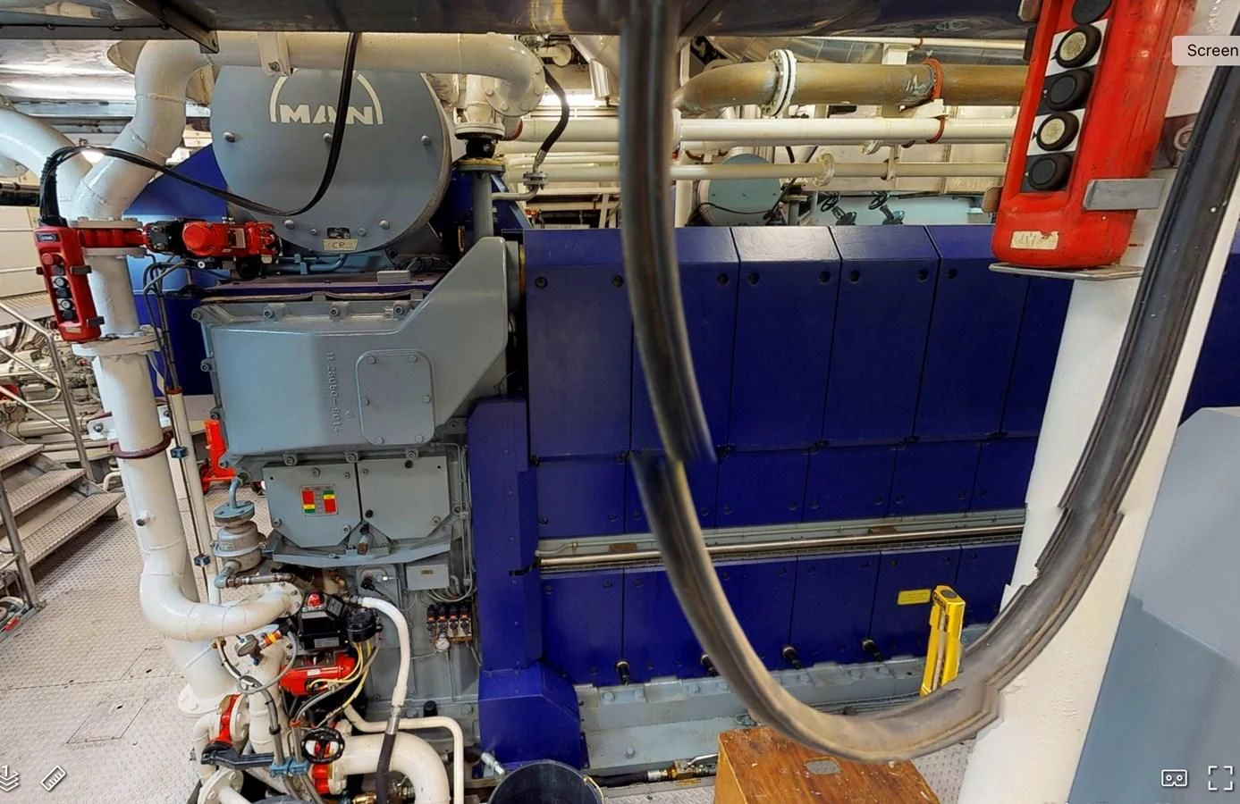 a machine with a large piece of equipment on it aboard OCEAN XPLORER 71 Yacht for Sale
